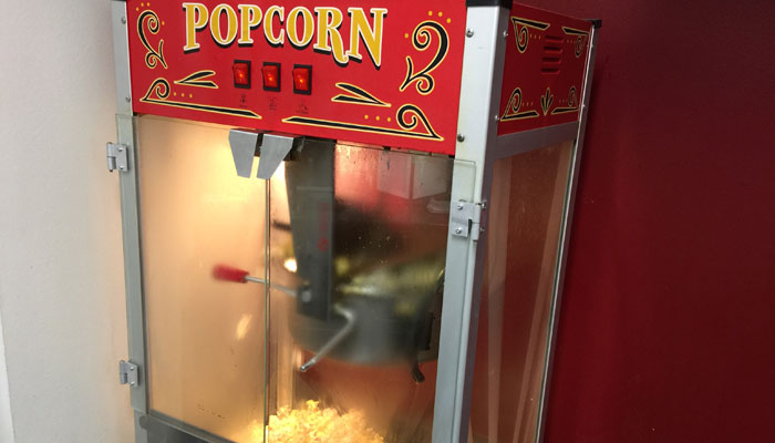 Freshly popped popcorn inside a popcorn machine at the Atwood Memorial Center information desk