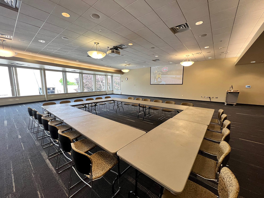 Cascade Room at Atwood Memorial Center from a different angle showing tables, chairs, and neutral decor suitable for events