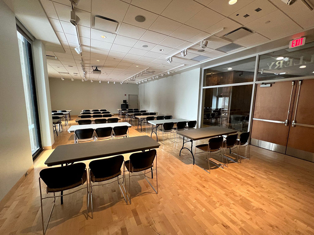Gallery Room at Atwood Memorial Center showing another perspective of the open space with tables and chairs arranged for an event
