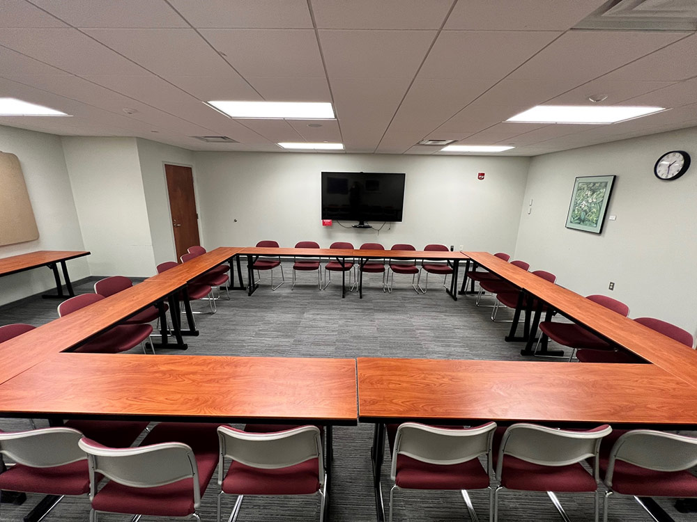 Maple Room at Atwood Memorial Center from a different angle showing meeting tables, chairs, and presentation setup