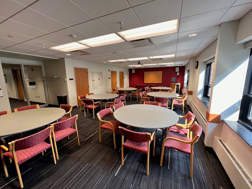 Mississippi Room at Atwood Memorial Center from a different angle showing meeting tables and chairs near wall windows