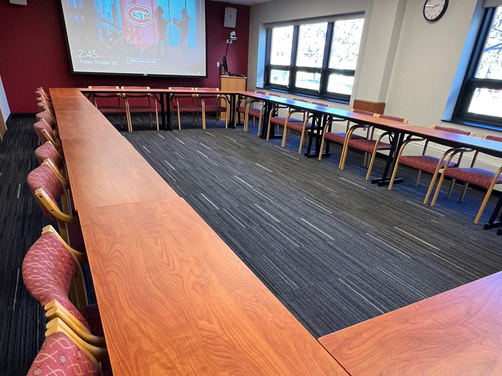 Interior view of the Mississippi Room at Atwood Memorial Center highlighting open floor space and table arrangements under bright lighting