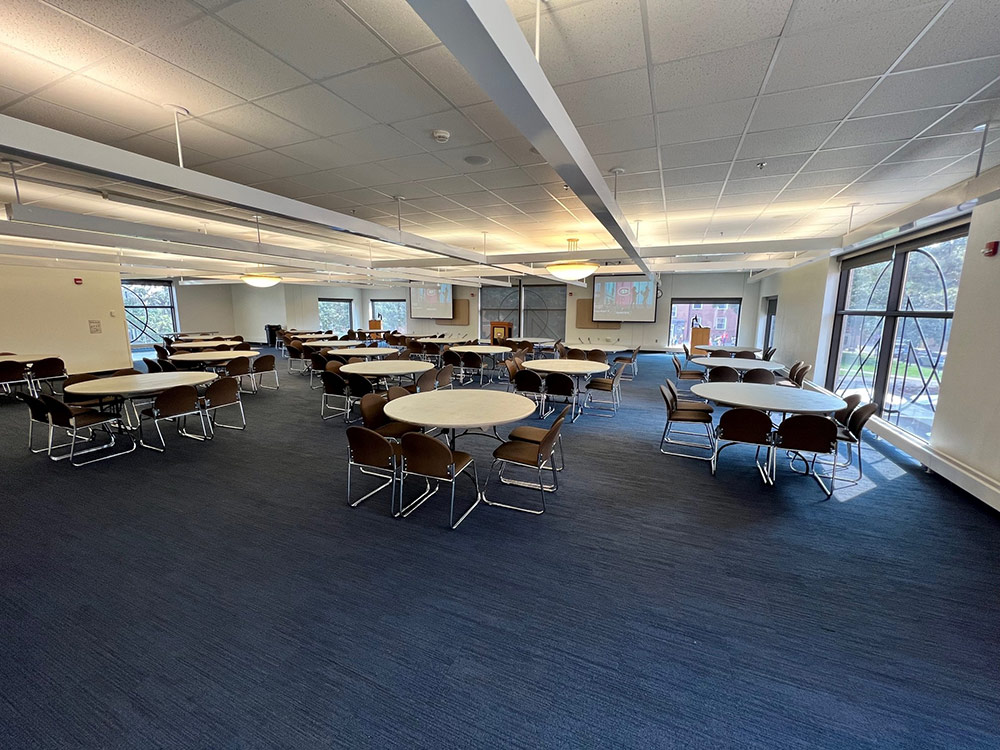 Voyageurs Room at Atwood Memorial Center from a different angle showing tables, chairs, and presentation setup