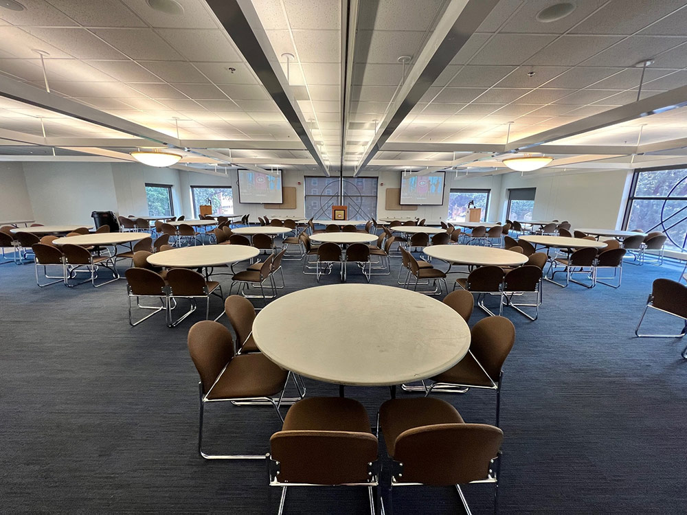 Interior view of the Voyageurs Room at Atwood Memorial Center highlighting seating arrangement and open floor space for meetings or events