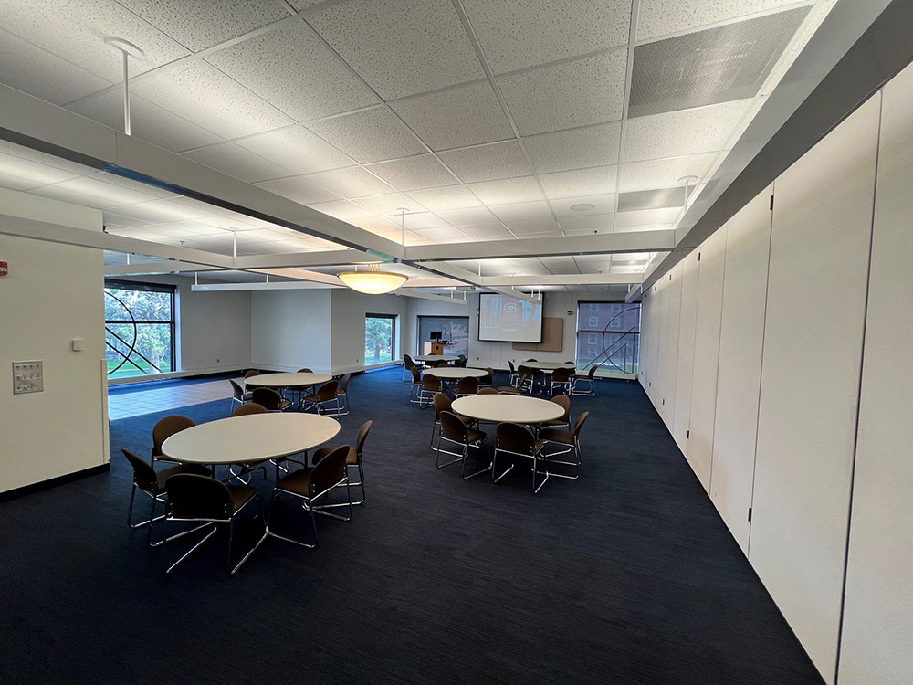 Voyageurs North Room at Atwood Memorial Center from a different angle showing combined tables, chairs, and a flexible meeting setup